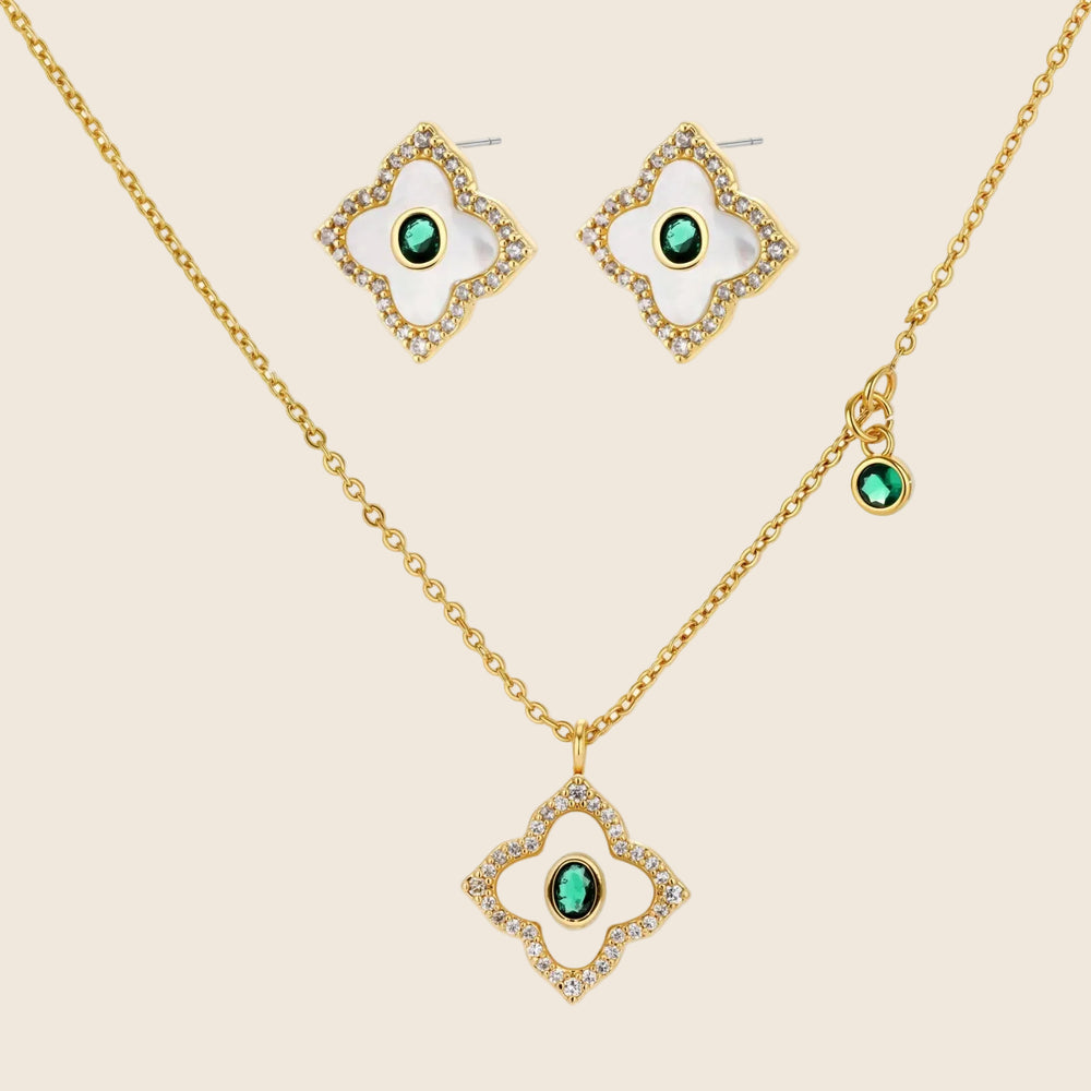 Gold-plated jewelry set with diamond-shaped pendants featuring white centers, green stones, and sparkling zirconia borders