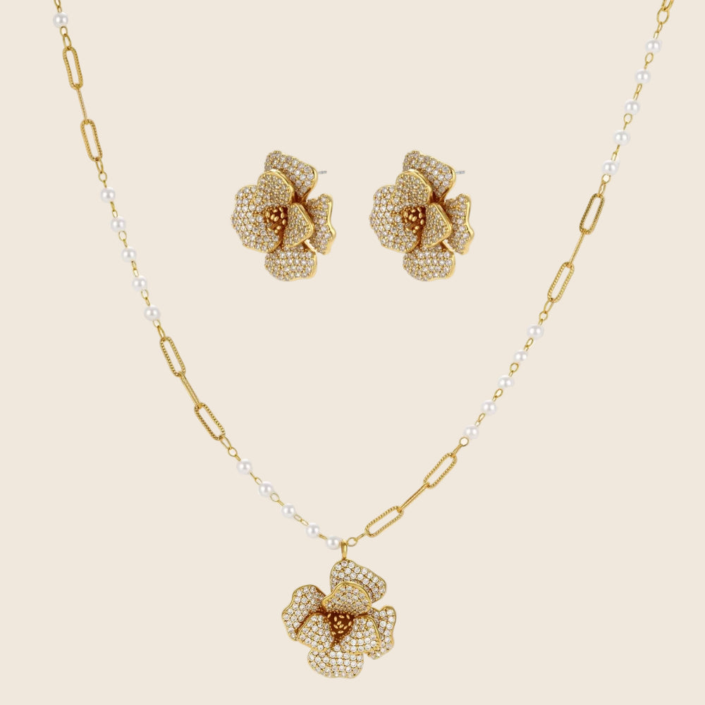 14K gold-plated flower jewelry set with zirconia crystals, featuring dimensional petal necklace and matching earrings